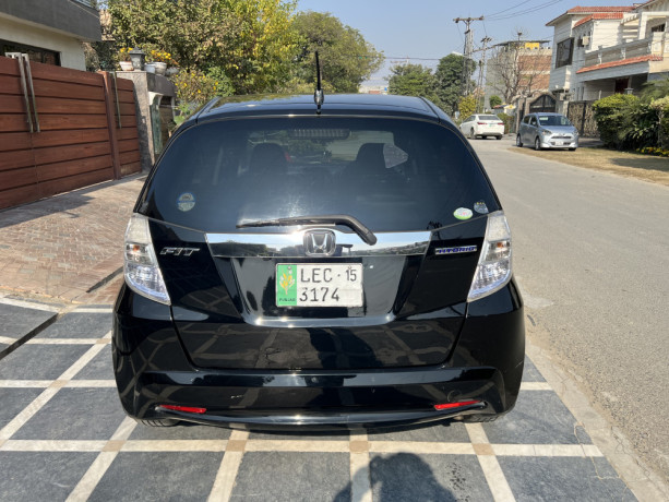 honda-fit-hybrid-201115-total-genuine-full-option-big-6